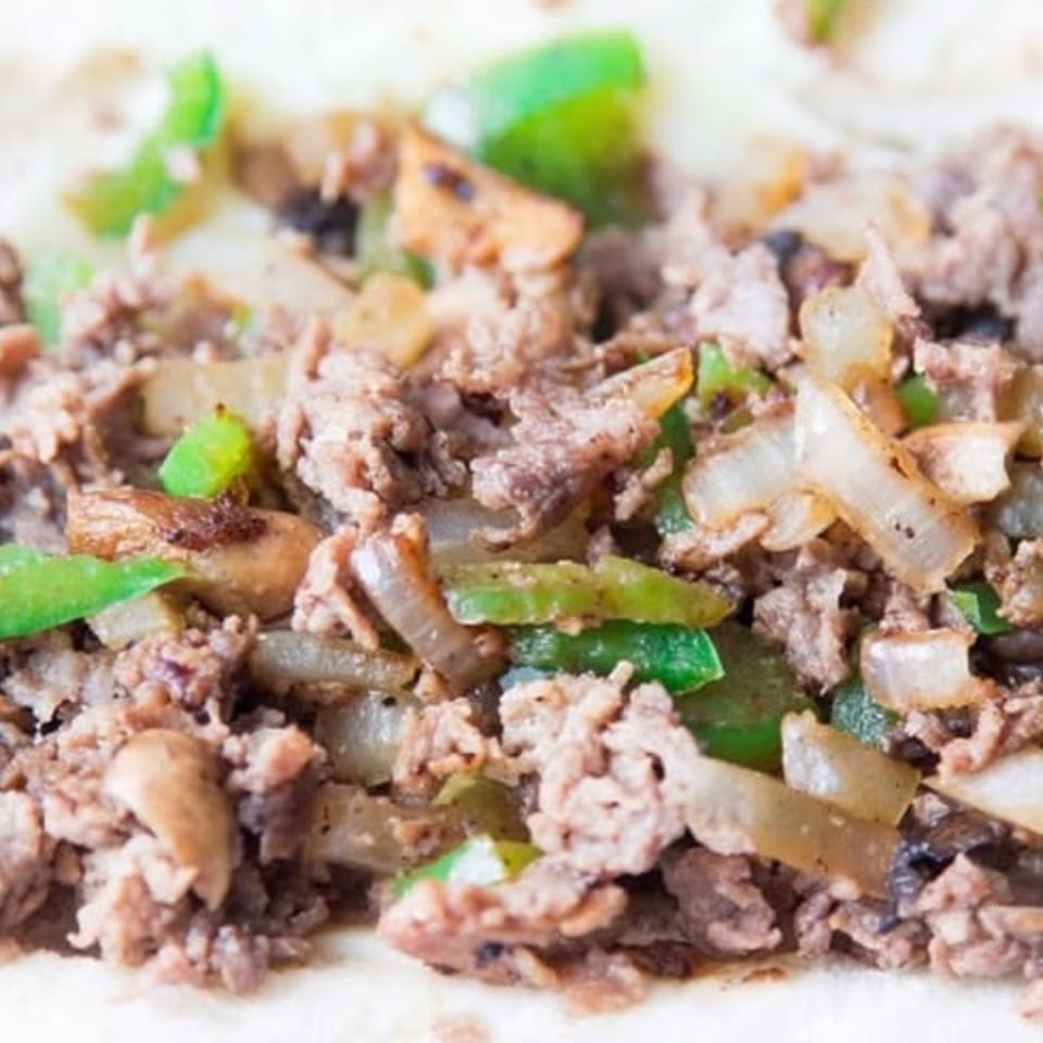 Indulge in Our Cheesesteak